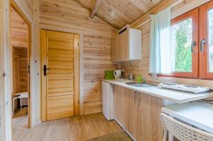 Η κουζίνα ή μικρή κουζίνα στο Kaszubski Zakątek +24 φωτογραφίες