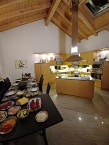 Kuchyň nebo kuchyňský kout v ubytování Aquarell Apartments