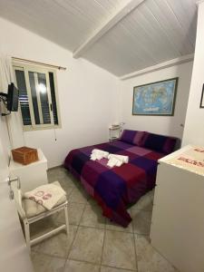 Postel nebo postele na pokoji v ubytování Villa Il Sole