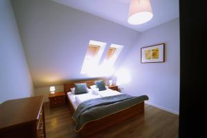 Posteľ alebo postele v izbe v ubytovaní Apartament Karpacz Walk&Ski