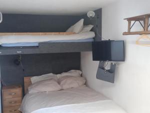 Krevet ili kreveti u jedinici u okviru objekta Chalet Beauroc