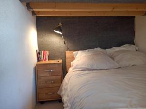 Krevet ili kreveti u jedinici u okviru objekta Chalet Beauroc
