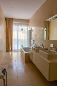 Kúpeľňa v ubytovaní Residenz Schooren des Alpes - Apartment SET - TOP 10