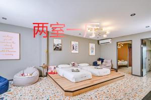 Postel nebo postele na pokoji v ubytování 仙本那爱丽家民宿Elly's Home