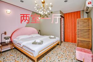 Postel nebo postele na pokoji v ubytování 仙本那爱丽家民宿Elly's Home