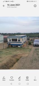 a collage of two pictures of a house and a car at Heacham South Beach static caravan in Heacham