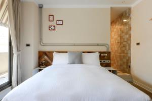 Llit o llits en una habitació de Napas Hotel