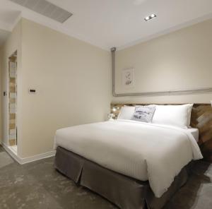 Llit o llits en una habitació de Napas Hotel