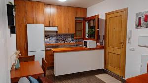 Kuchyň nebo kuchyňský kout v ubytování Apartamento sueños de la Alhambra, Realejo Granada