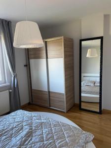 Postel nebo postele na pokoji v ubytování Apartman Vera