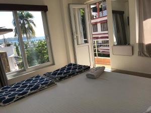 Кровать или кровати в номере Andaman Vacations Home