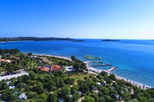 an aerial view of a beach and the ocean at Glamping and Mobile Homes Lavanda - Holiday Centre Bi VIllage in Fažana