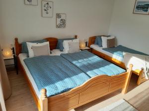Postel nebo postele na pokoji v ubytování Appartements Schusser