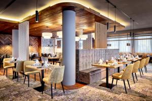 Reštaurácia alebo iné gastronomické zariadenie v ubytovaní Active Nature Resort DAS SeeMOUNT