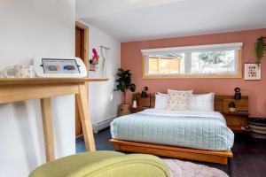 a bedroom with a bed and a window at The Herwood Inn in Woodstock