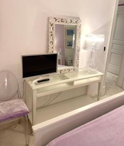 TV a/nebo společenská místnost v ubytování Casa del corso