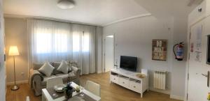 Televízia a/alebo spoločenská miestnosť v ubytovaní Castro Holidays - Vistas Mar y Monte Céntrico Garaje Gratis