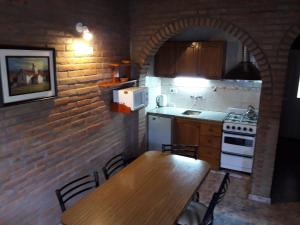 Complejo Arco Iris tesisinde mutfak veya mini mutfak