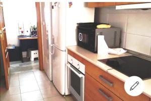 Kuchyňa alebo kuchynka v ubytovaní Habitación con encanto