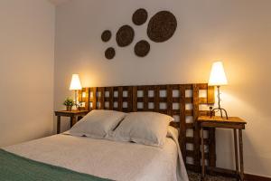 A bed or beds in a room at La Vaquería