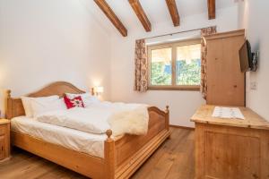 Ліжко або ліжка в номері Chalet-Appartement mit Penthouse Flair