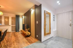 Część wypoczynkowa w obiekcie Apartamenty Maja i Zuzia