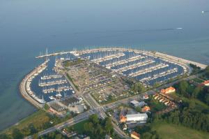 an aerial view of a marina with manyocked boats at Hus m gaard have, 25m fra havet, havn, Strand, High speet internet, restauranter in Rungsted
