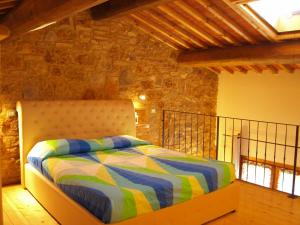 Cama o camas de una habitación en Azienda Agrituristica Il Poggetto Delle Spighe