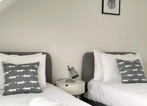 Posteľ alebo postele v izbe v ubytovaní The Tack Room