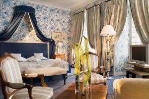 Телевизор и/или развлекательный центр в Château De Villiers-Le-Mahieu