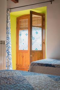 Posteľ alebo postele v izbe v ubytovaní Hostal-Resturante La Moruga