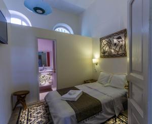 Giường trong phòng chung tại Jerusalem Garden Home +38 ảnh