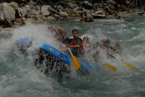 a group of people in a raft in a river at Camping Drina in Foča
