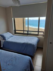 Voodi või voodid majutusasutuse Arenamaris Apartment toas