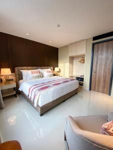 Postel nebo postele na pokoji v ubytování Prime Park Hotel & Convention Lombok