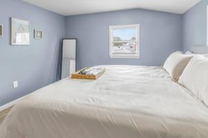 Voodi või voodid majutusasutuse Family Style 5BR Home Mins From Buckroe Beach toas