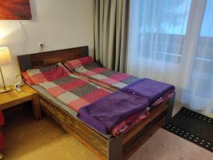 Postel nebo postele na pokoji v ubytování Ferienapartment "Alois" in Sankt Englmar
