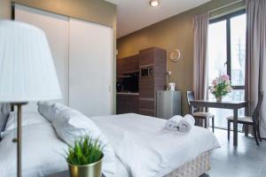 Postel nebo postele na pokoji v ubytování Empihaus 001 Empire Damansara