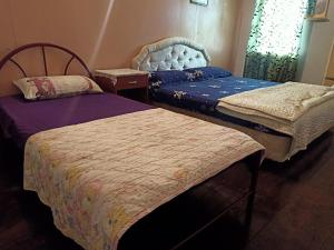 Krevet ili kreveti u jedinici u okviru objekta OYO Home 90430 Mountain Resthouse