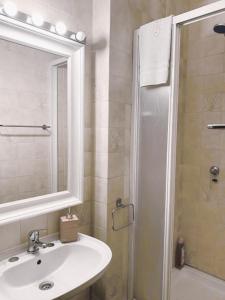 Et badeværelse på Praia de Vila do Conde com vista a mar