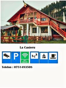 a picture of a house with a sign in front of it at La Casieru in Bilbor