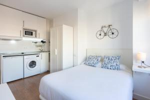 Ein Bett oder Betten in einem Zimmer der Unterkunft LU&CIA Malagueta 9