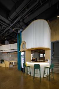 Reštaurácia alebo iné gastronomické zariadenie v ubytovaní Joylive BSD City