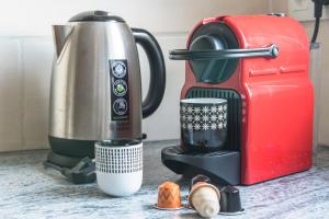 a kitchen counter with a coffee maker and a blender at Nouveau - La Parenthèse in Wingersheim