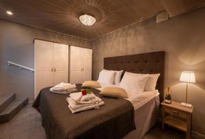 Кровать или кровати в номере Spa Hotel Runni Iisalmi