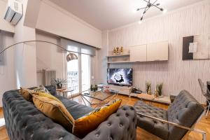 A television and/or entertainment centre at Alopece City Apartment - Kolonaki
