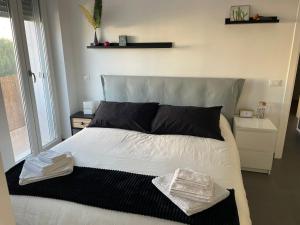 Кровать или кровати в номере CasaBlanco