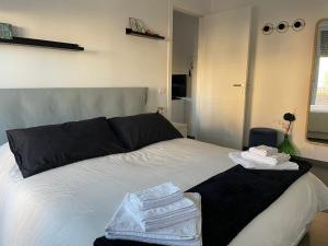 Кровать или кровати в номере CasaBlanco +16 фотографий