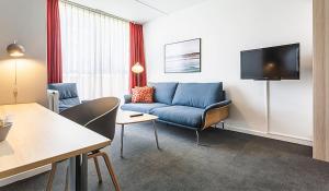 TV a/nebo společenská místnost v ubytování Skaga Hotel