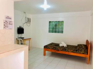 Postel nebo postele na pokoji v ubytování RB Baruiz "Hideaway" Inn - Cebu South